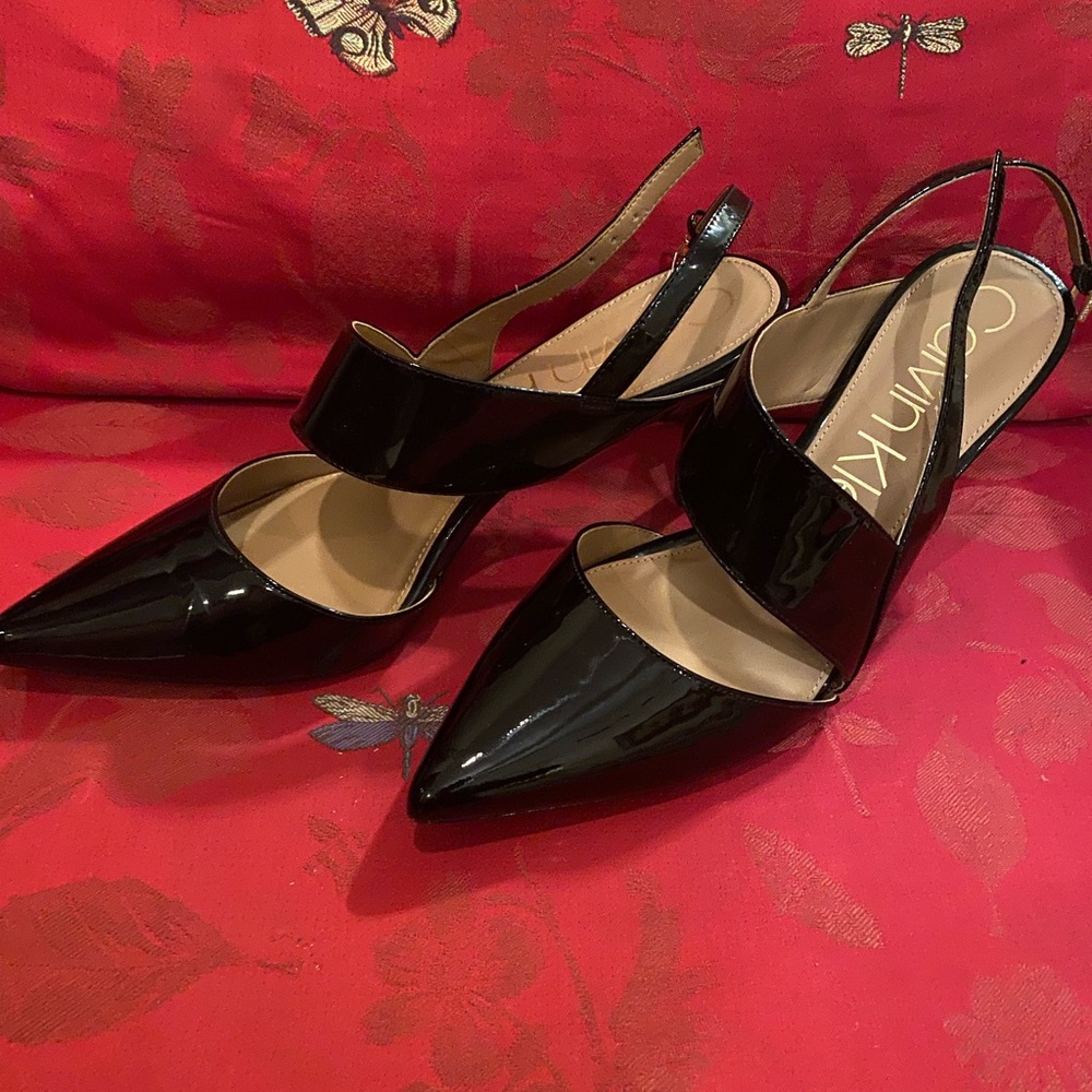 Brand new Black Patent Calvin Klein Women’s Shoes. Size 11.